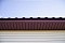 Софит металлический без перфорации 0,5 GreenCoat Pural с пленкой RR 23 темно-серый (RAL 7024 мокрый асфальт)